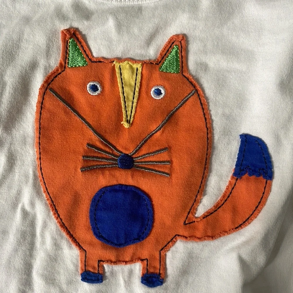 Hanna Andersson appliqué onesie for baby